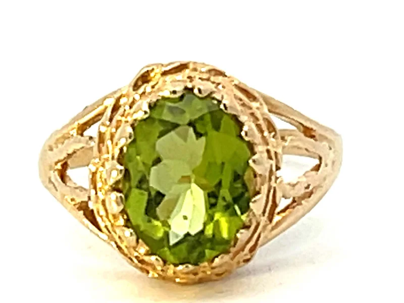 Women’s halo diamond rings-Oval Peridot Ring in 14k Yellow Gold