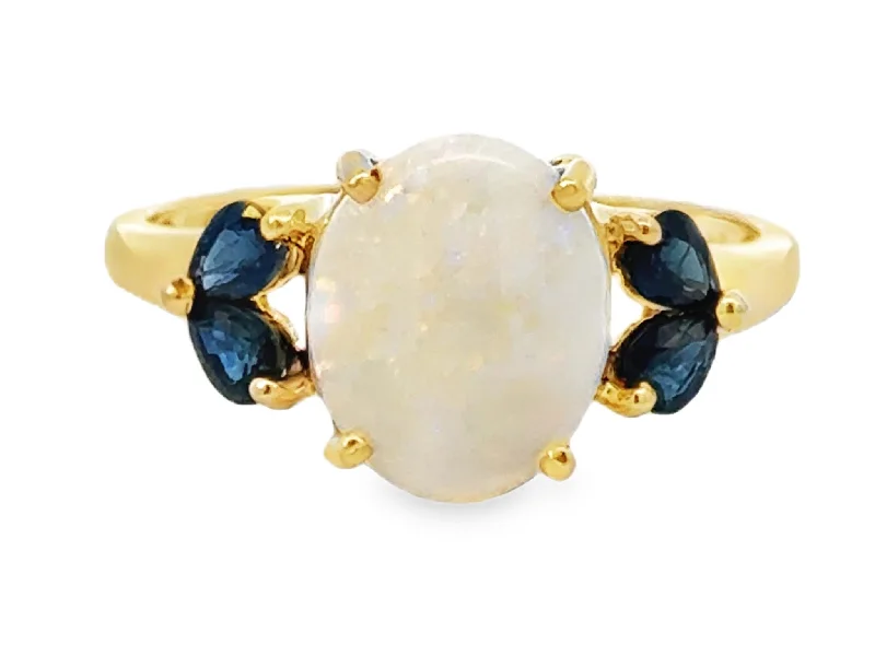 Women’s custom diamond rings-Oval Cabochon Opal and Pear Shaped Sapphires Ring 14k Yellow Gold