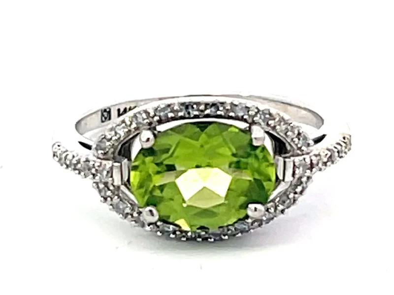 Women’s two-tone rings-Oval Green Peridot and Diamond Halo Ring in 14k White Gold