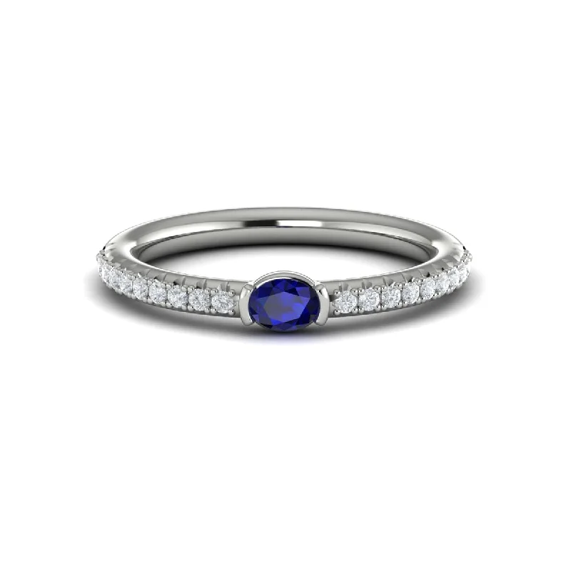 Diamond and Oval Sapphire Centerstone Ring