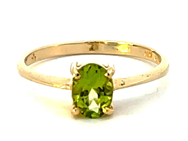 Women’s promise rings-Oval Peridot Ring in 14k Yellow Gold