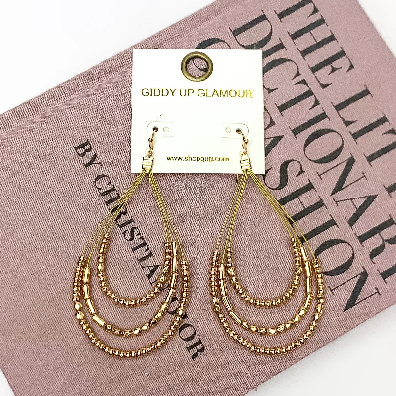 Women’s silver chandelier earrings-Layered Open Teardrop Earrings With Beads in Gold Tone