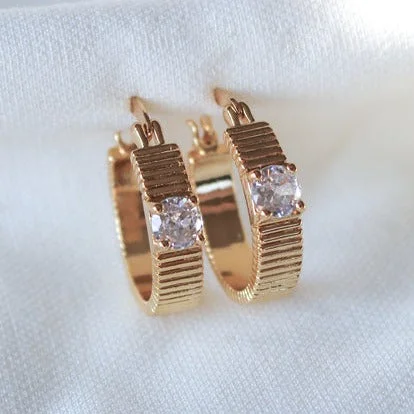 Women’s heart-shaped earrings-Kinsey Designs | Quinn Gold Tone Ridged Hoop Earrings with CZ Crystal Accent