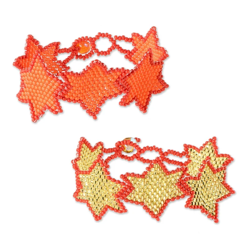 Women’s vintage charm bracelets-Novica Handmade Star Duo In Orange Beaded Wristband Friendship Bracelets (Pair)