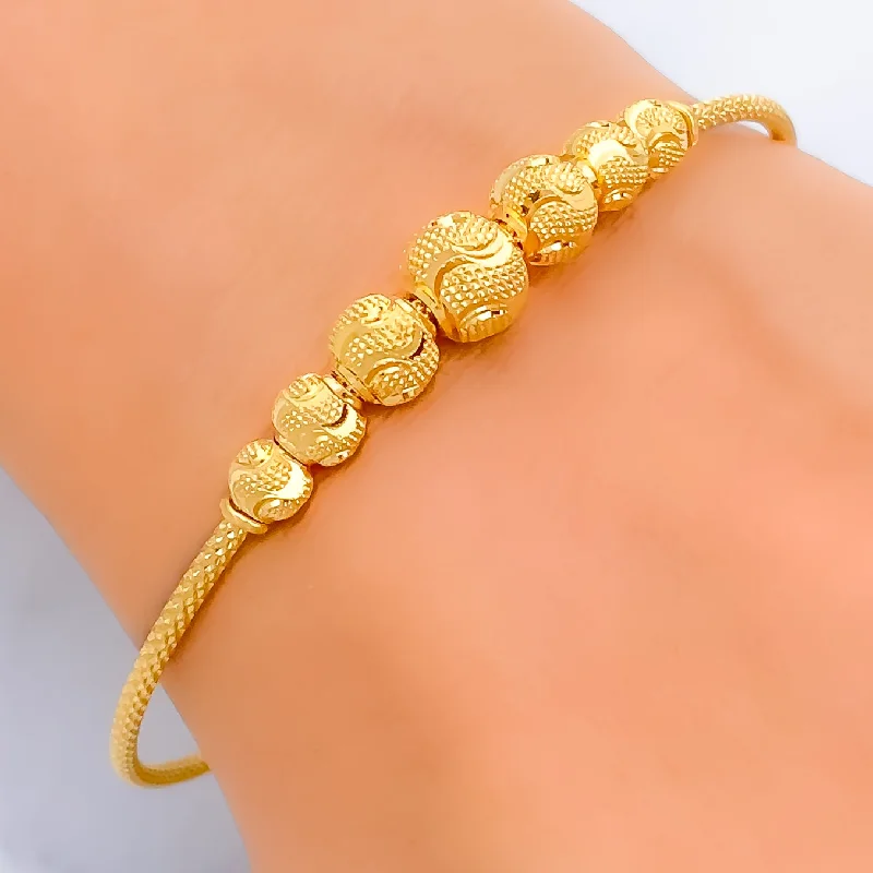 Women’s engraved charm bracelets-Shimmering Vibrant 22k Gold Bangle Bracelet