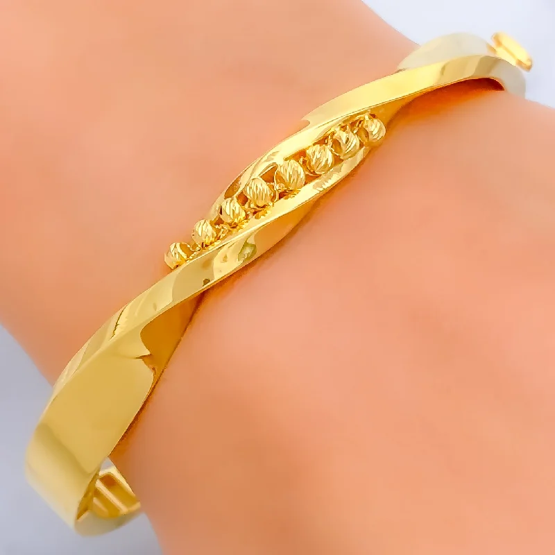 Women’s engraved bracelets-Iconic Flowing 22k Gold Bangle Bracelet